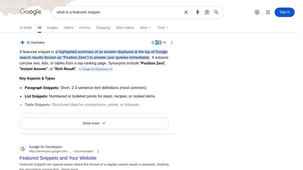 A Google search results page displaying a prominent featured snippet box at the top, answering the question 'what is a featured snippet'.